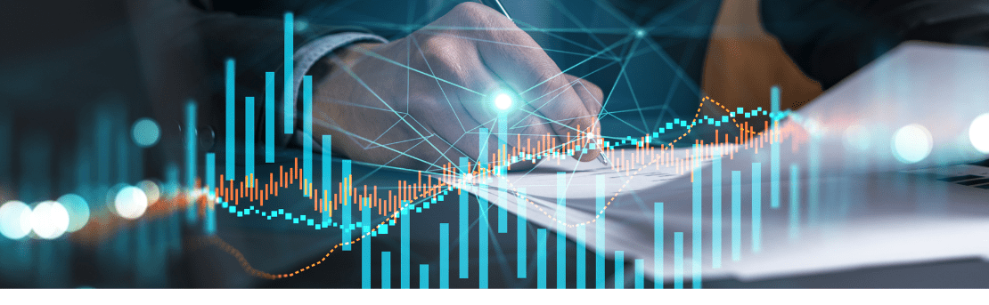 A hand writing on paper with graphs overlaid on the image.