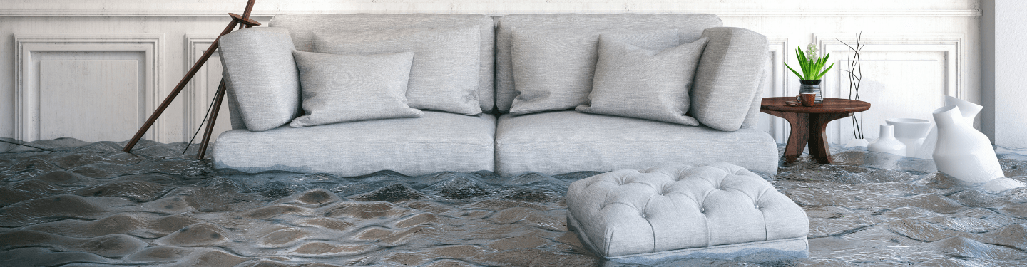 Couch in the living room surrounded by water