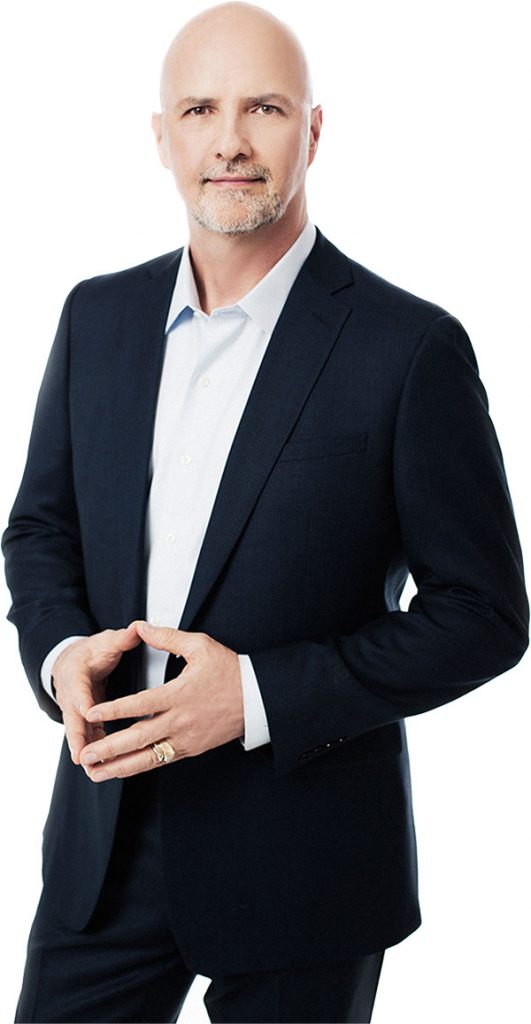 Man in a suit posing for the camera