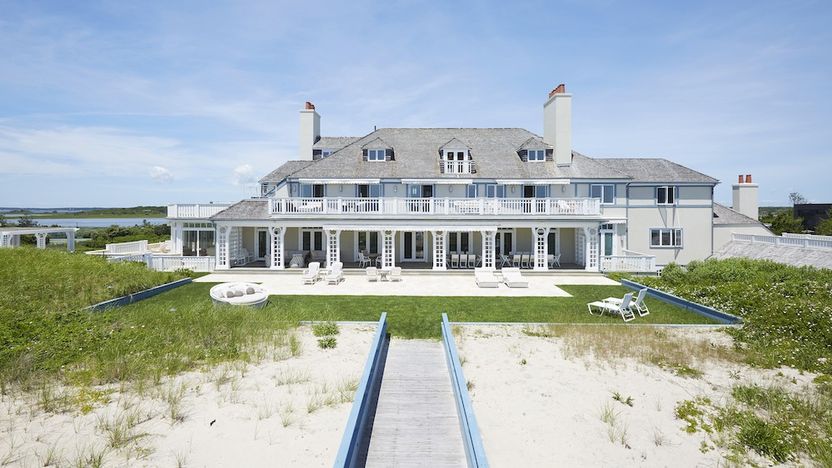 A white house on the water
